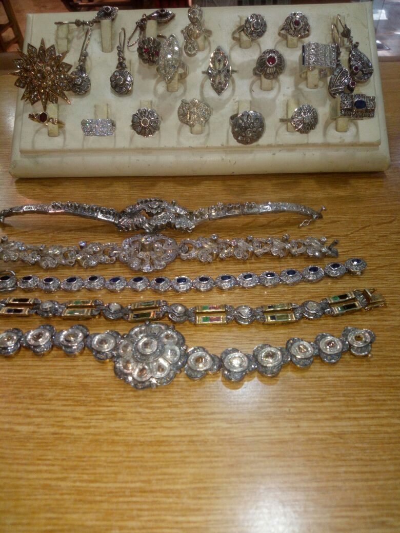 antiques shop, hand made jewelry, silver and bronze statues, old paintings, old chandeliers, all kinds of crystals